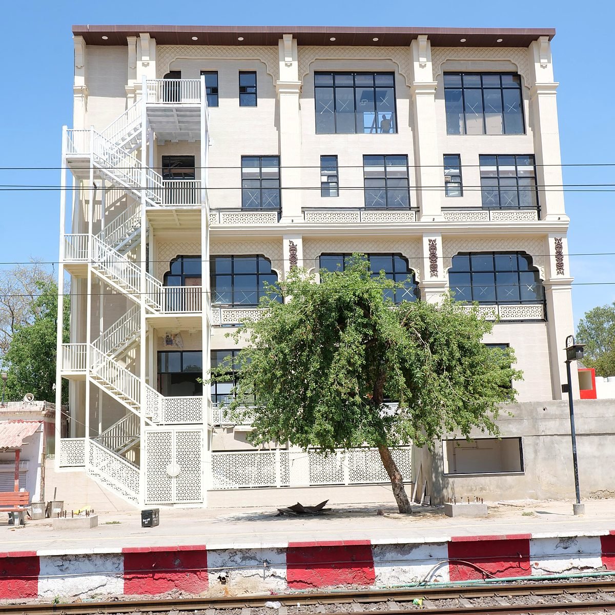 Front elevation from across the tracks